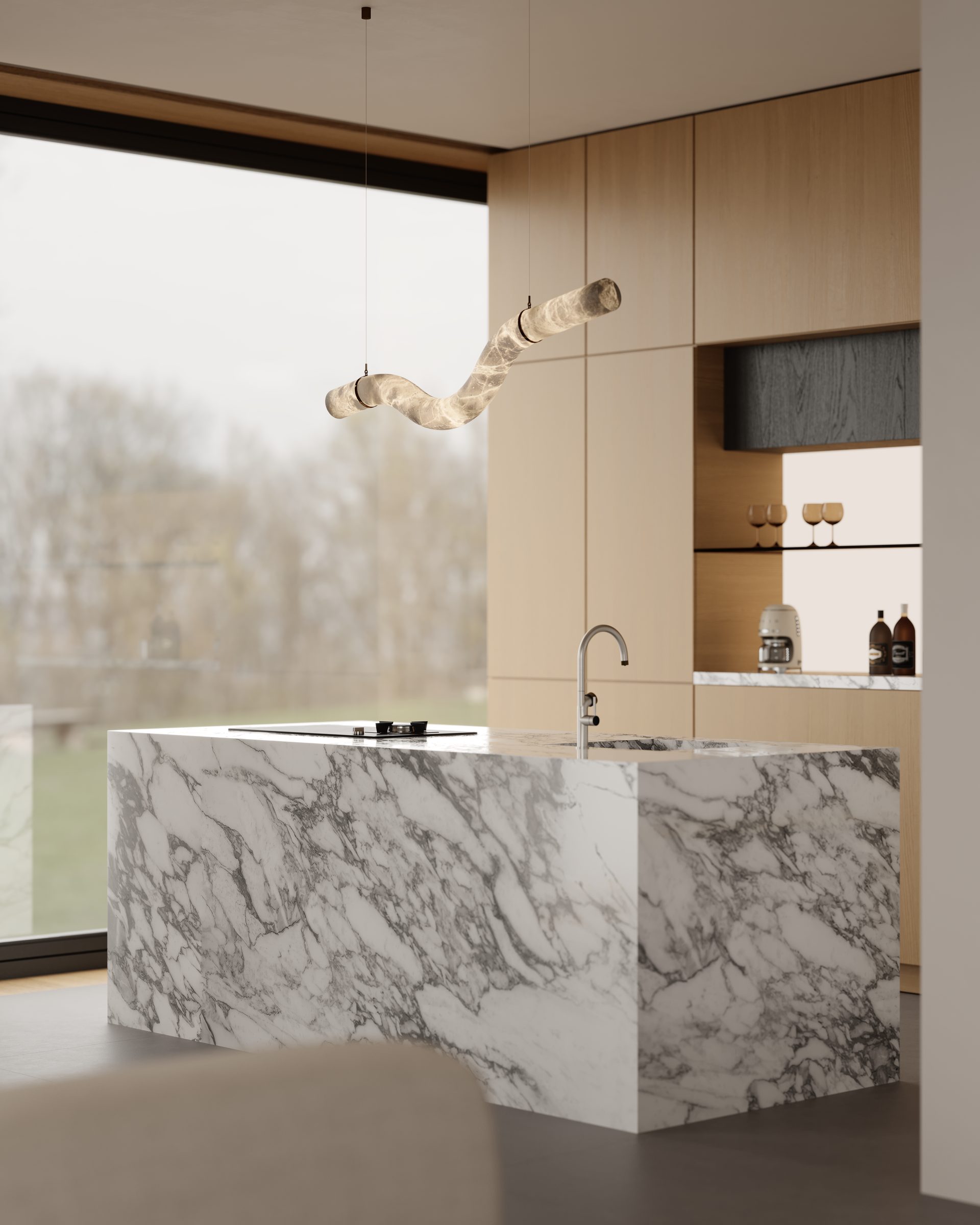 Marble kitchen island and sculptural pendant