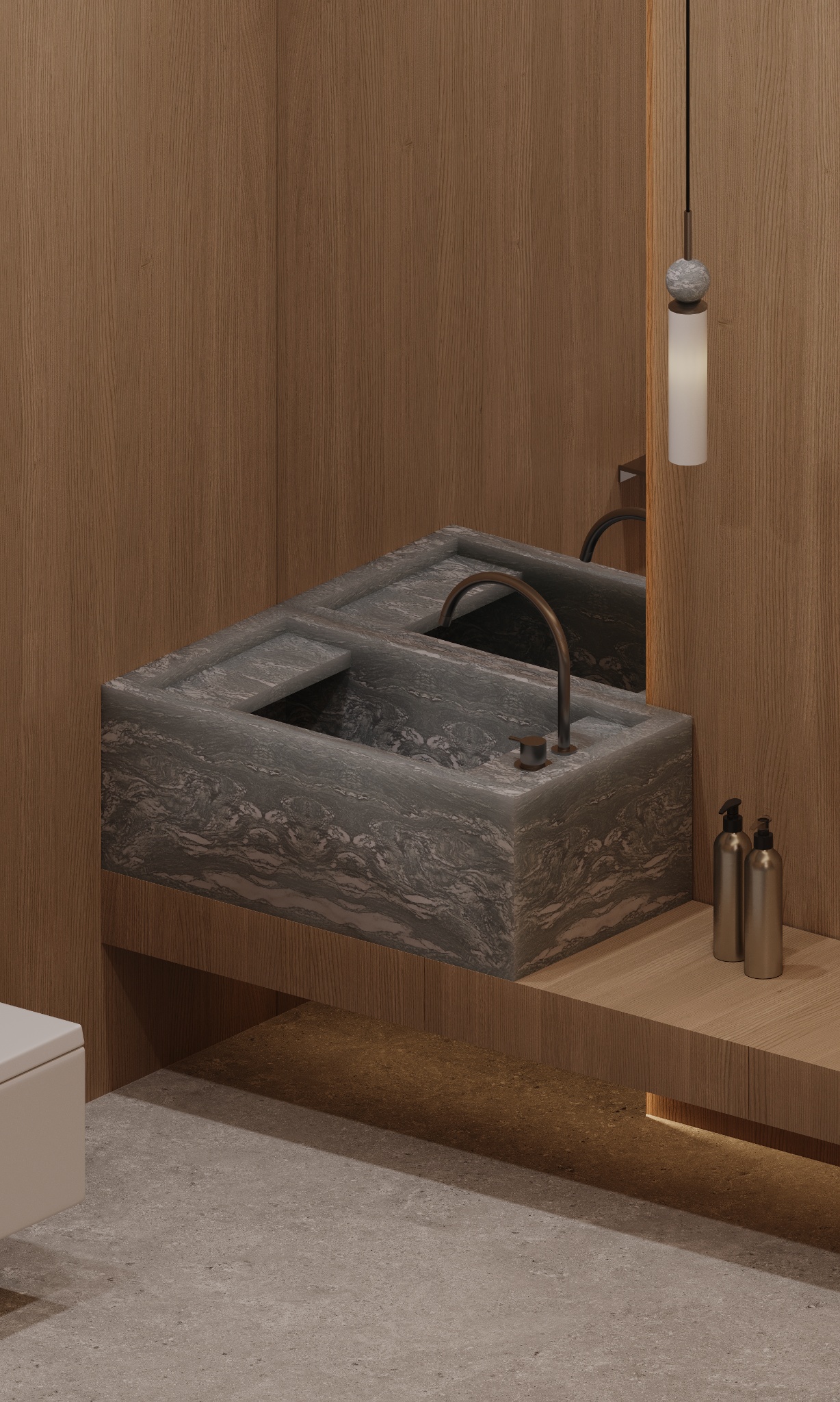 Stone vanity detail with bronze tap and pendant light