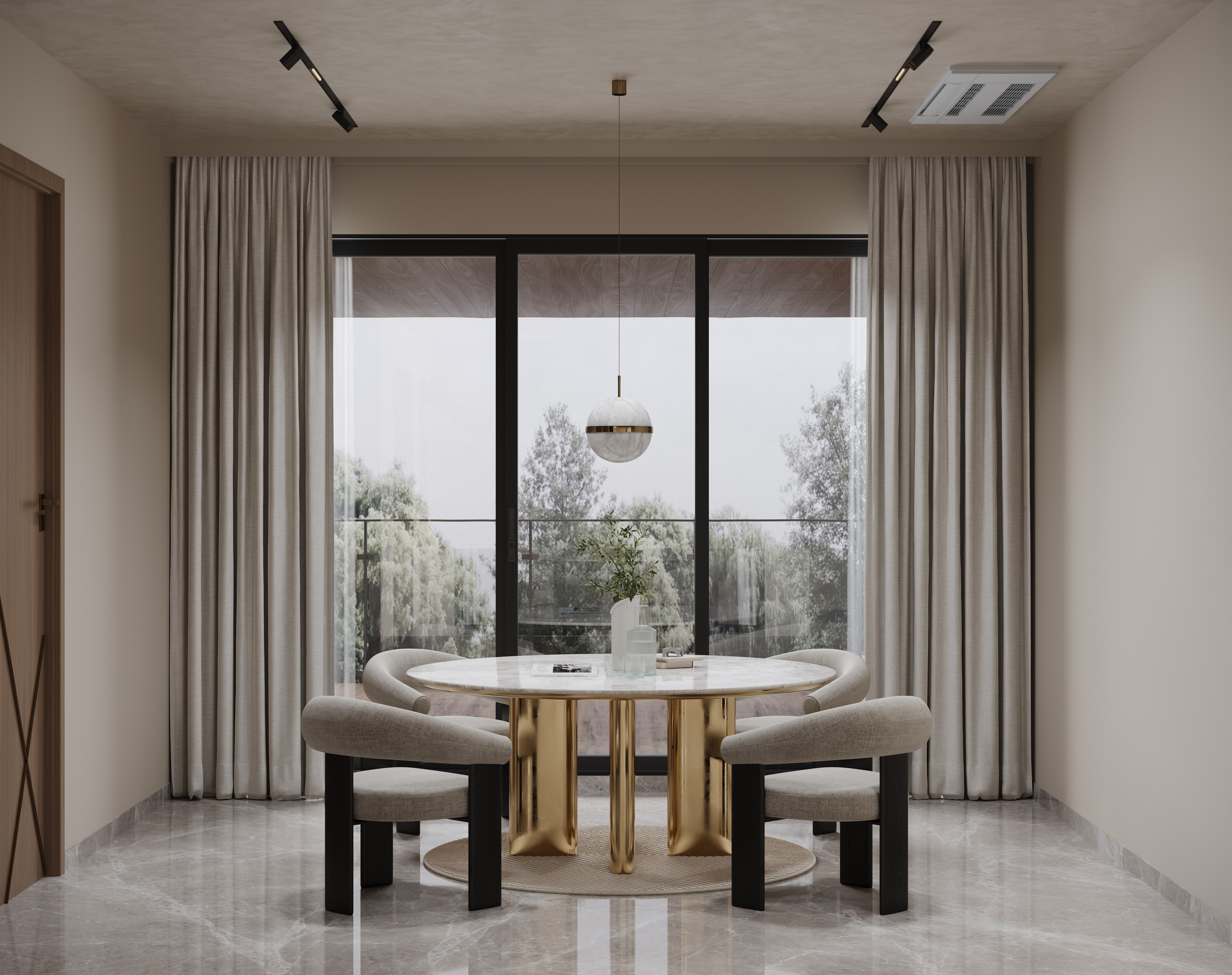 Round dining table with brass base